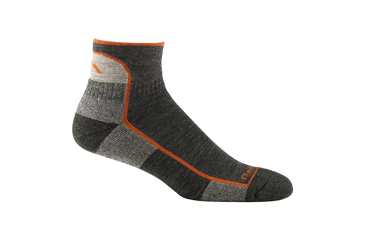 A two-tone gray Darn Tough sock on a white backgro