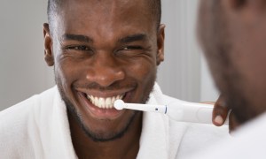 best teeth whiteners man brushing