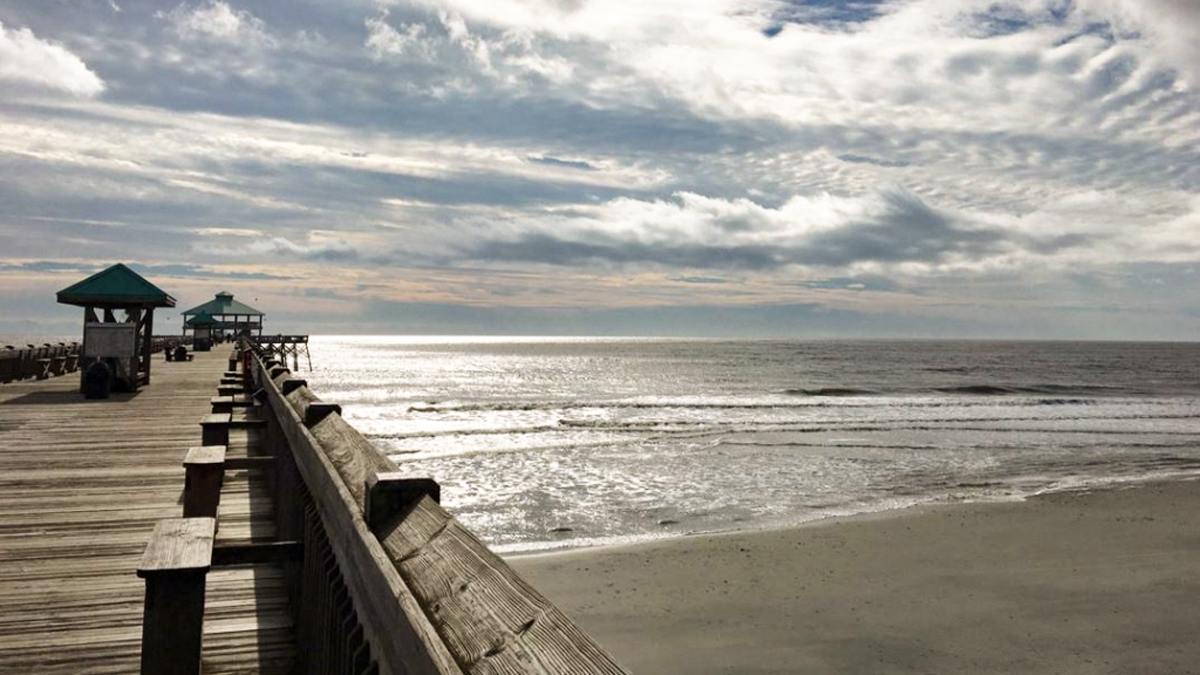 Looking down the pier at South Carolina's Folly Beach.