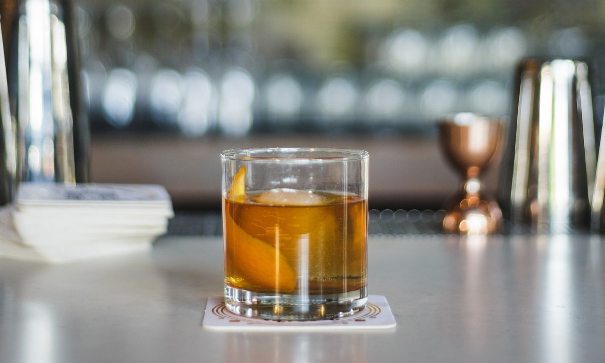 An Old Fashioned cocktail on a counter