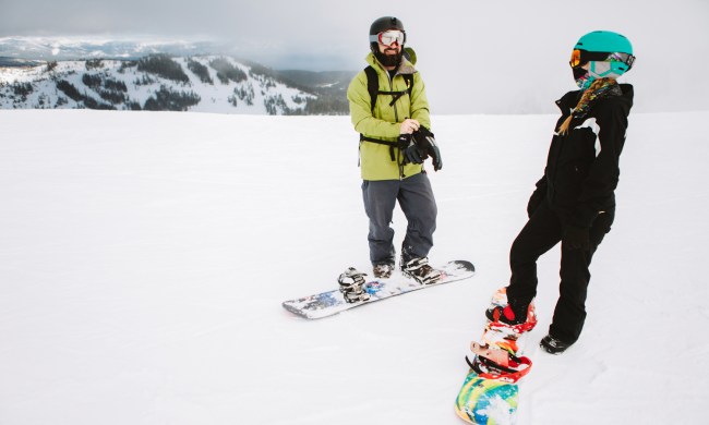 Couple on snowboards