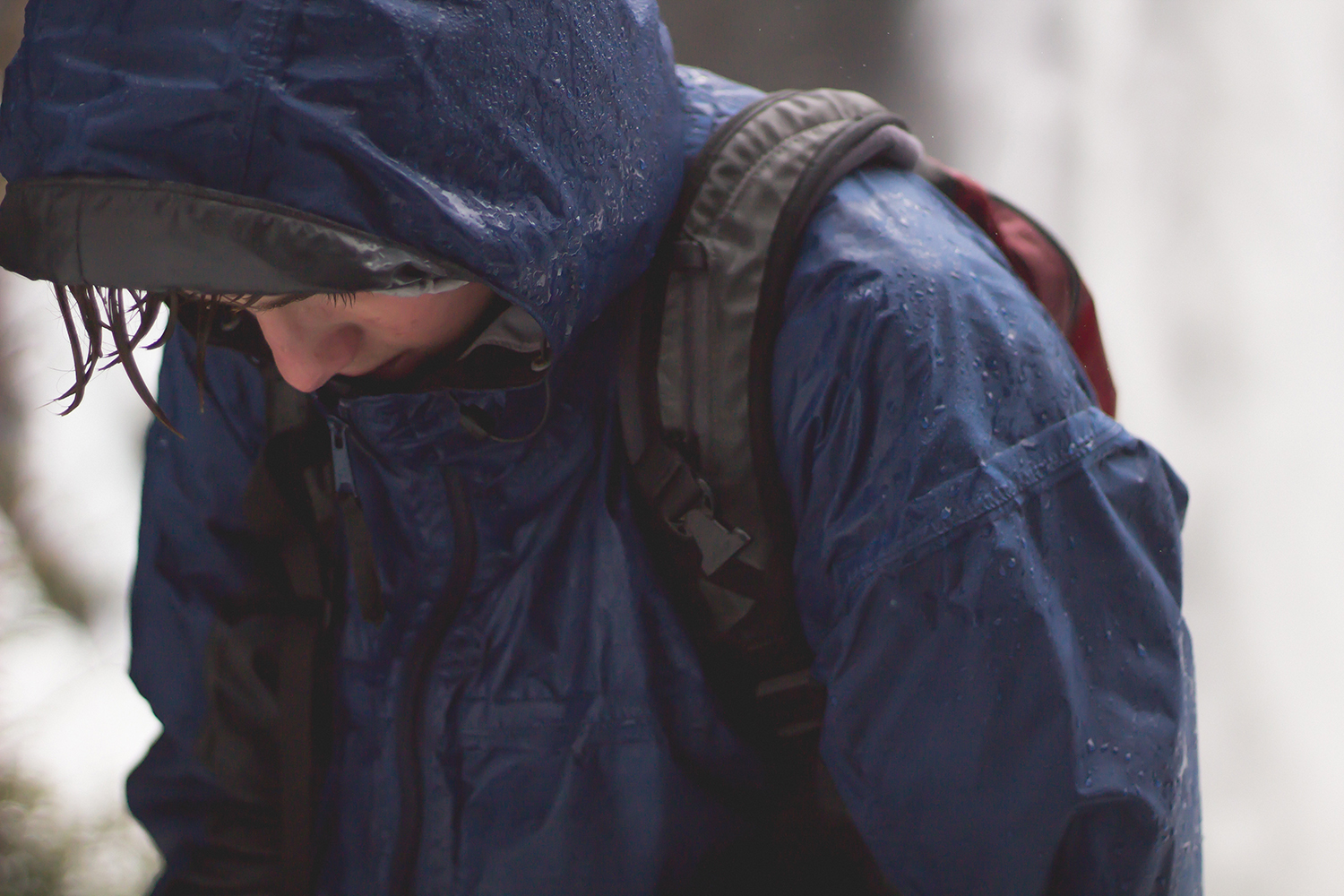 Person in a rain jacket in the rain