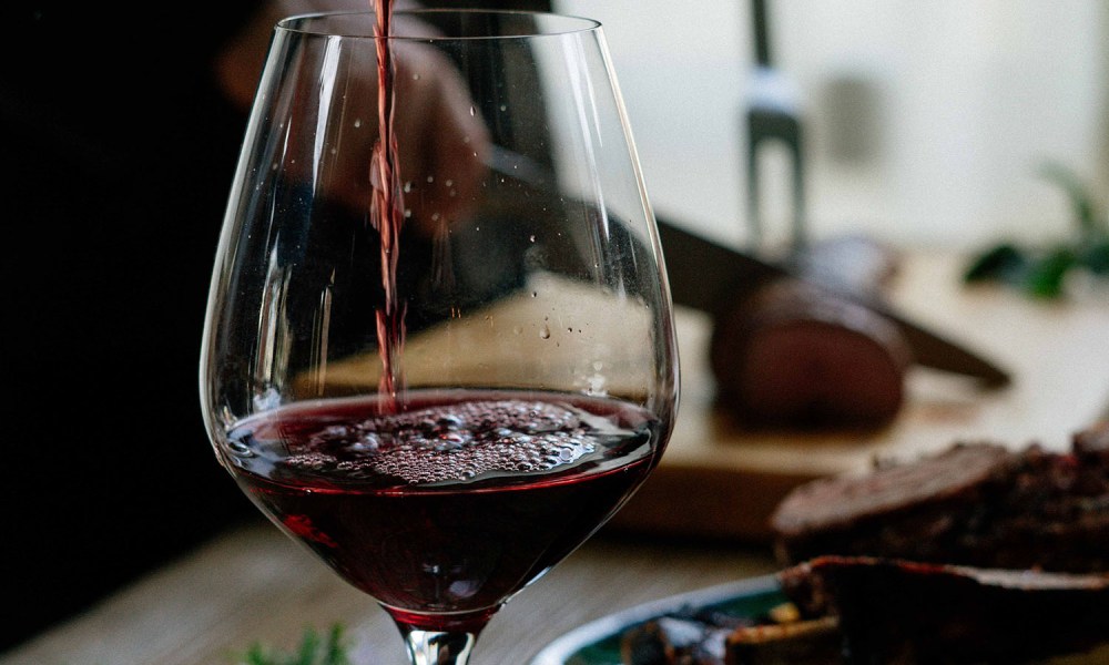 Merlot being poured into a glass