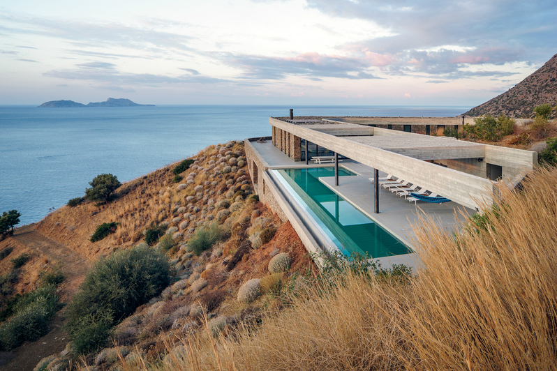 The Environmentally-Friendly Cliffside Ring House in Greece is