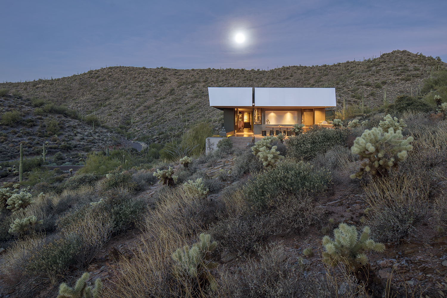 Steel And Concrete Rise From The Desert Floor In This Net Zero Home   Hidden Valley Desert House 07 