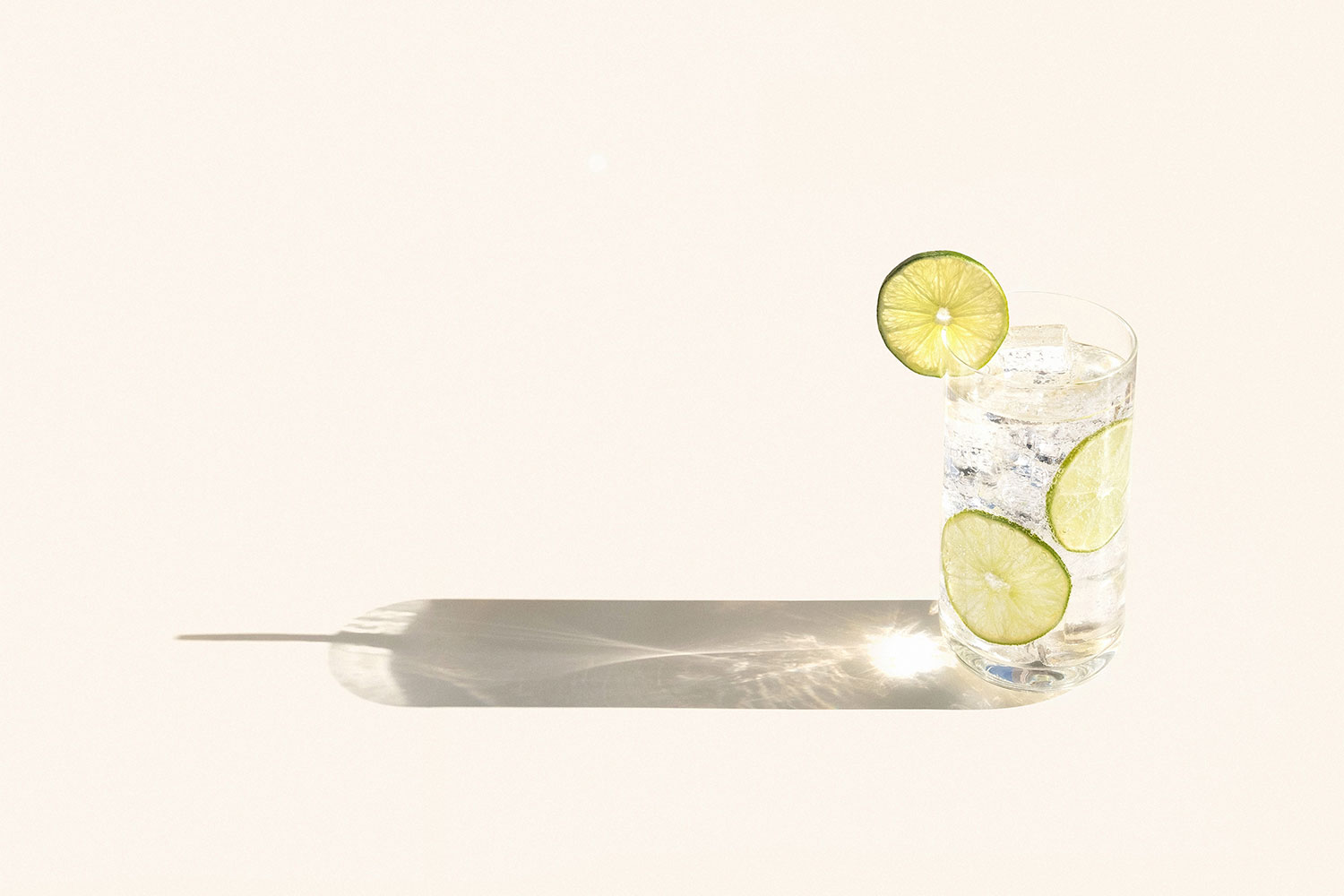 The Gin Rickey on a plain background