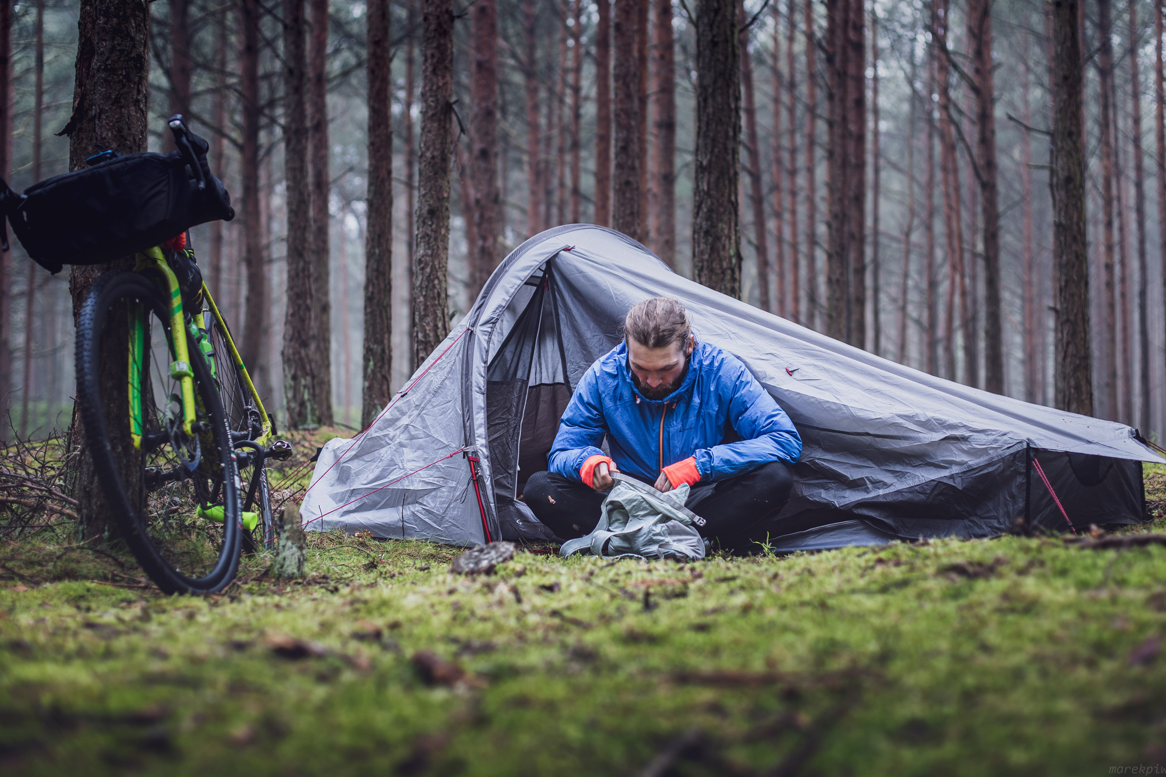 Setting up a 2024 tent in the rain