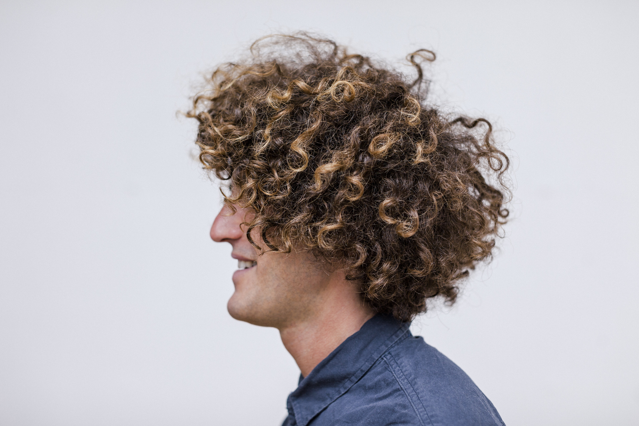 26 Sassy Hairstyles For Men With Curly Hair
