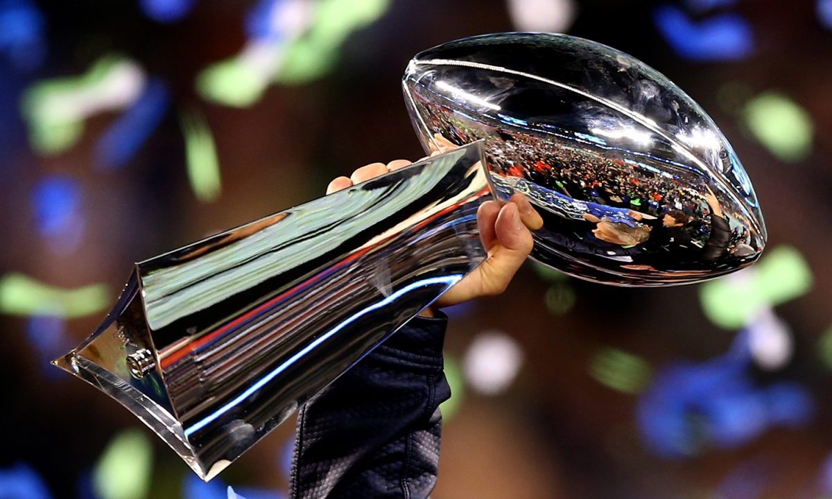 The Super Bowl trophy being held up