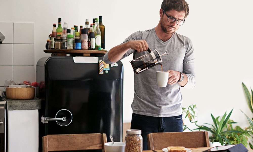 Man using a French press