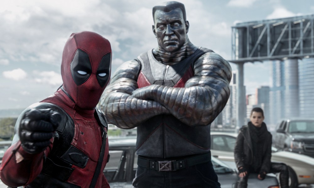 Deadpool outside next to other characters.