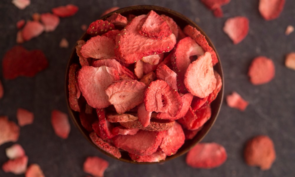 Freeze-dried strawberries on a slate counter