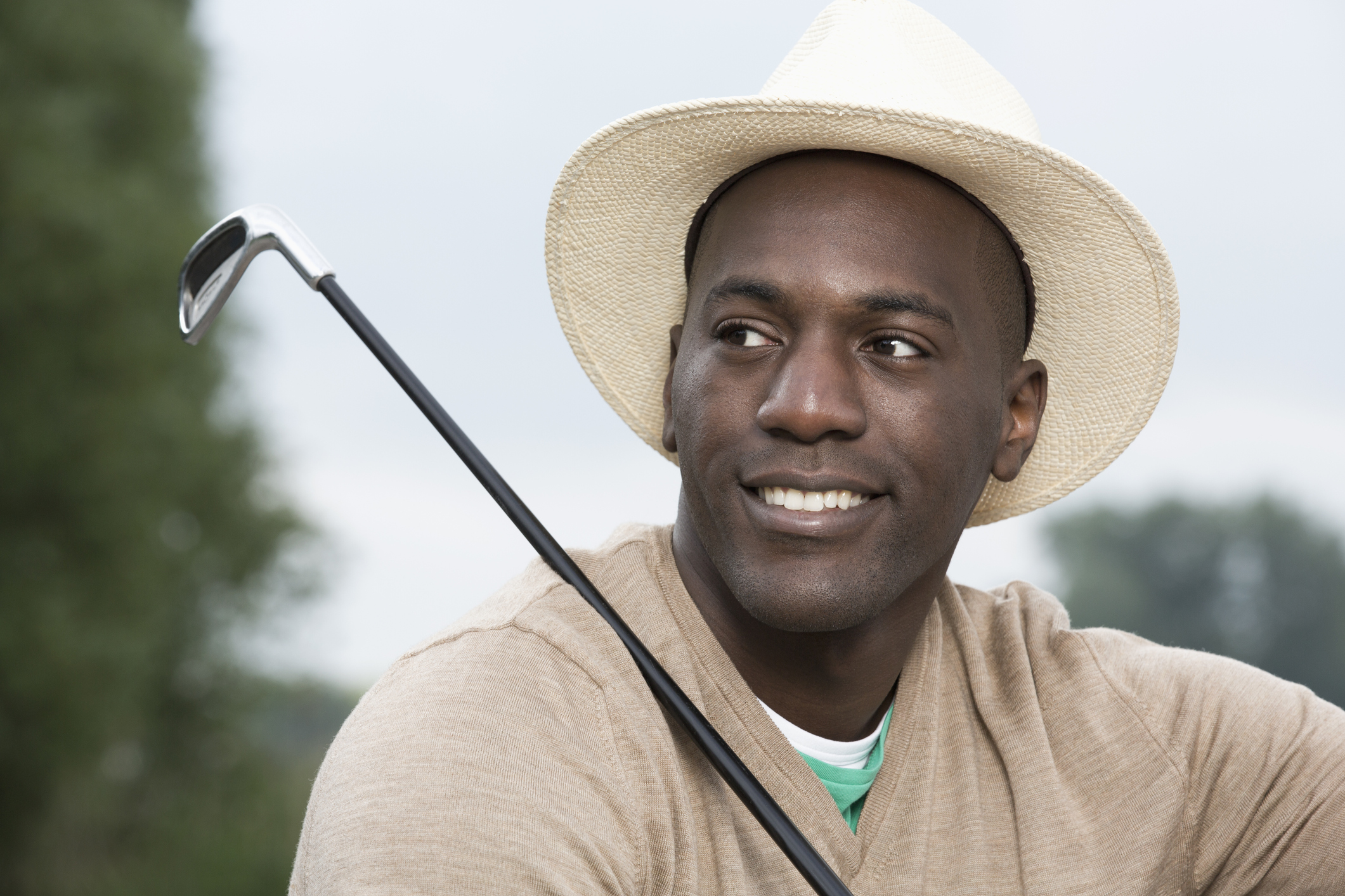 Man relaxing at the golf course