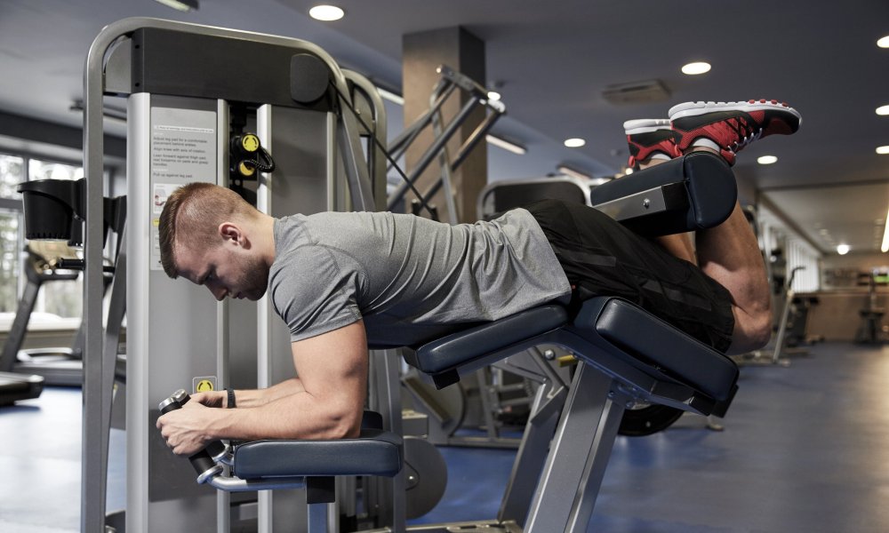 Man doing leg curls