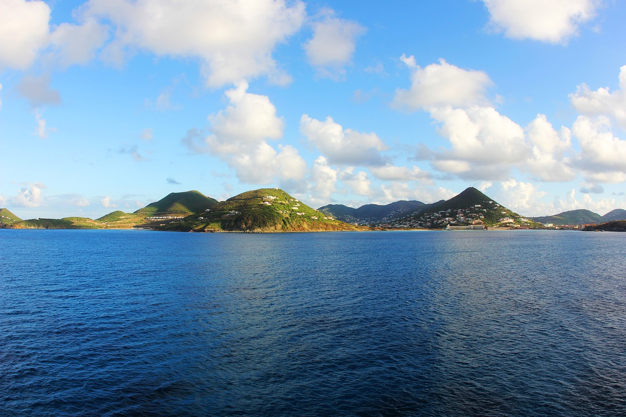 Green peaks of the Virgin Islands, seen from the water.