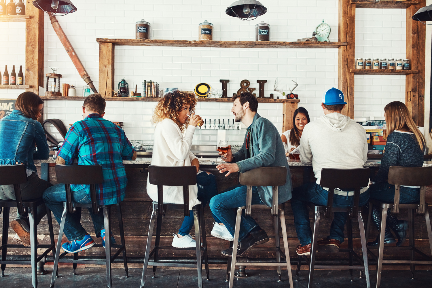 Couples having a good time at a bar