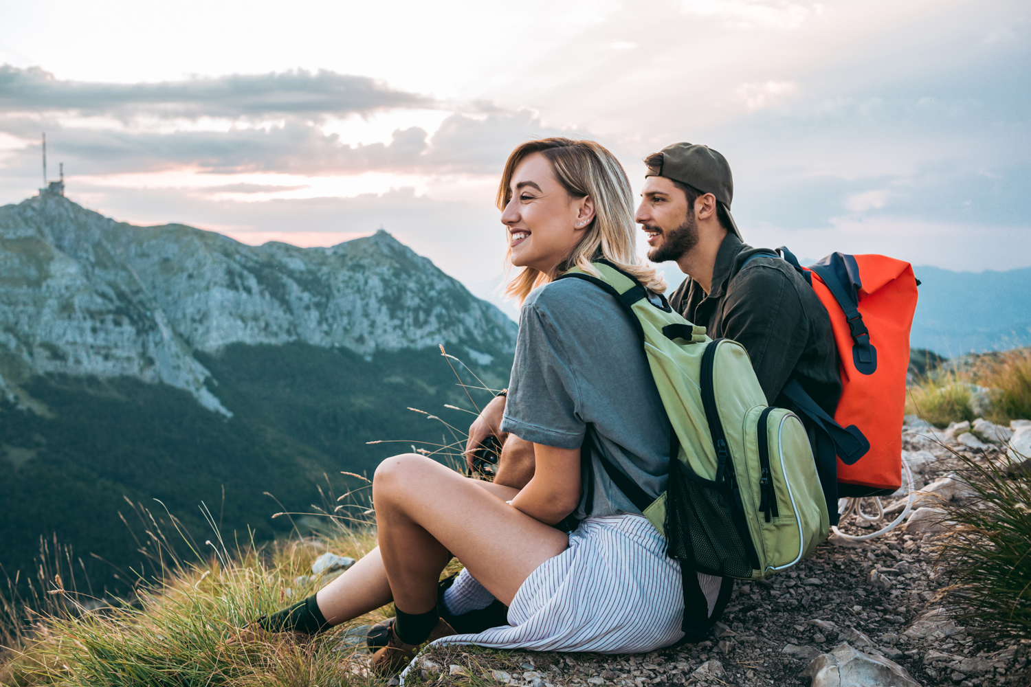 A couple resting after a long hike.