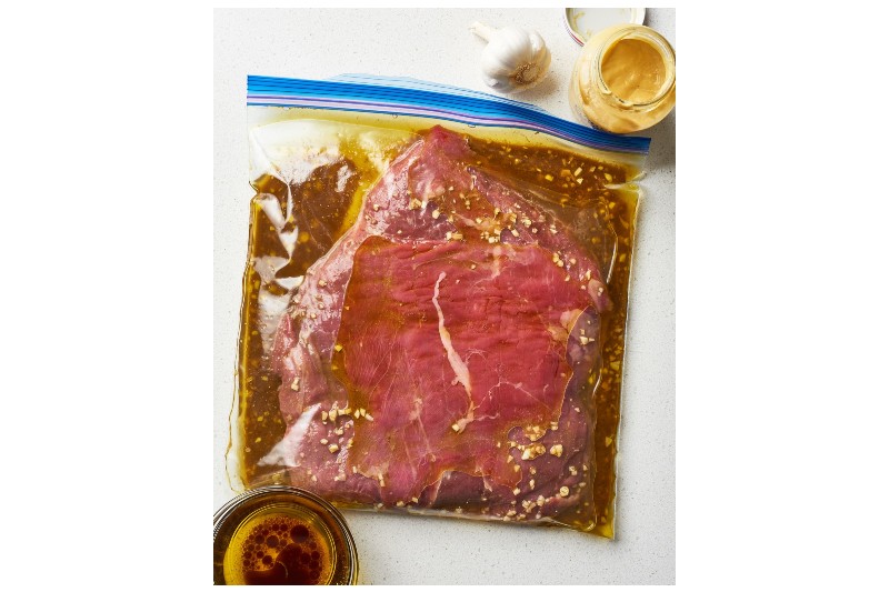 Steak marinade and meat in a bag.