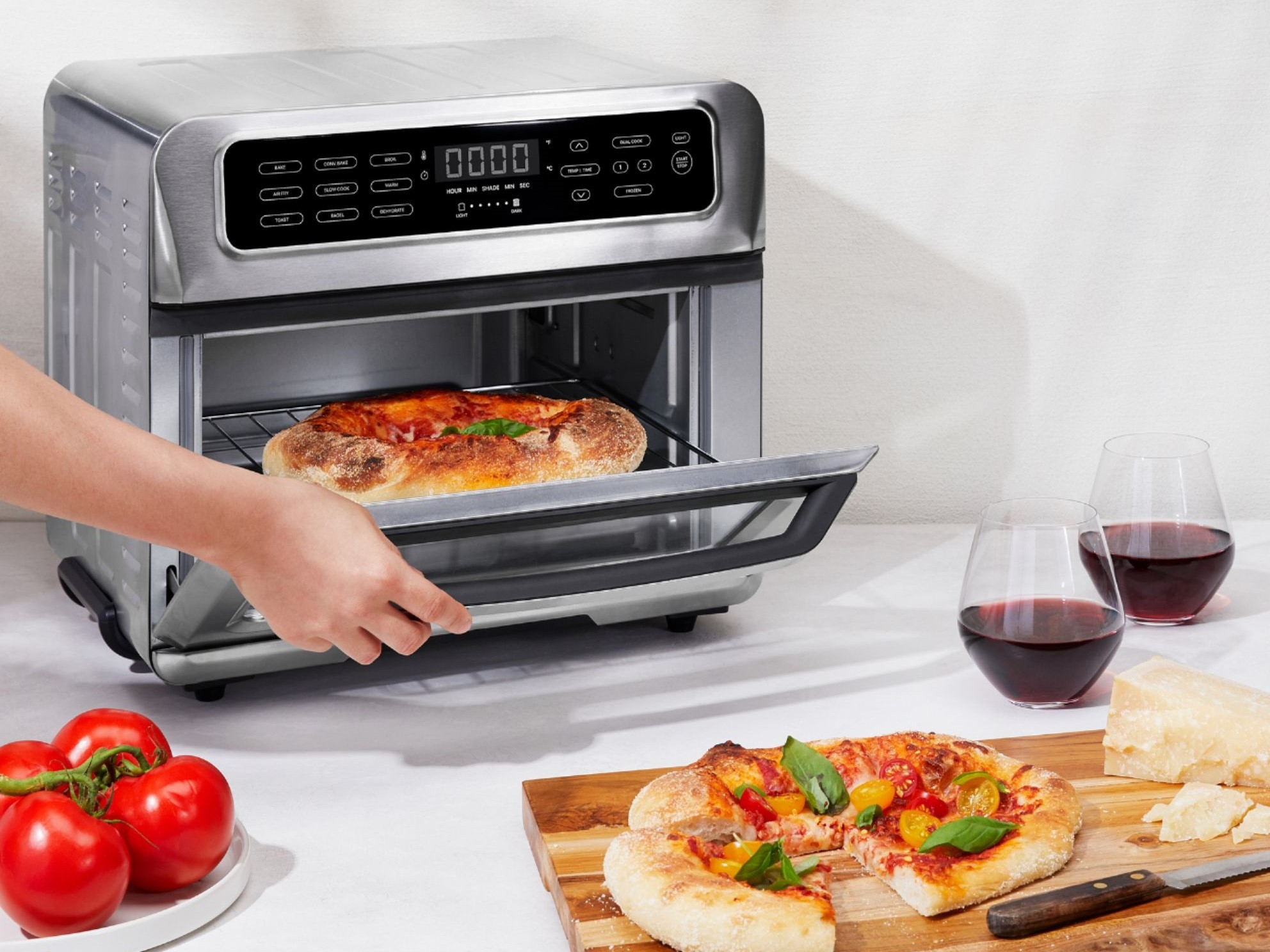 https://www.themanual.com/wp-content/uploads/sites/9/2021/08/chefman-toast-air-dual-function-20l-air-fryer-with-pizza.jpg?fit=1984%2C1488&p=1