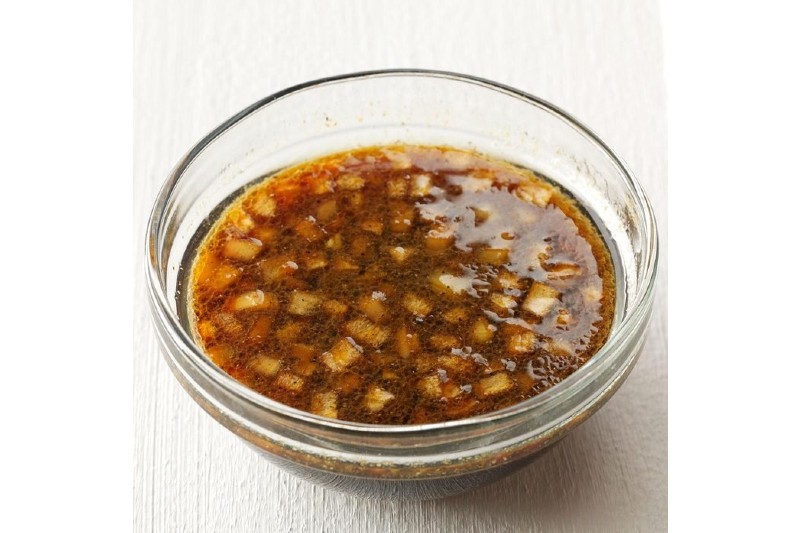 Teriyaki beef marinade in a bowl.