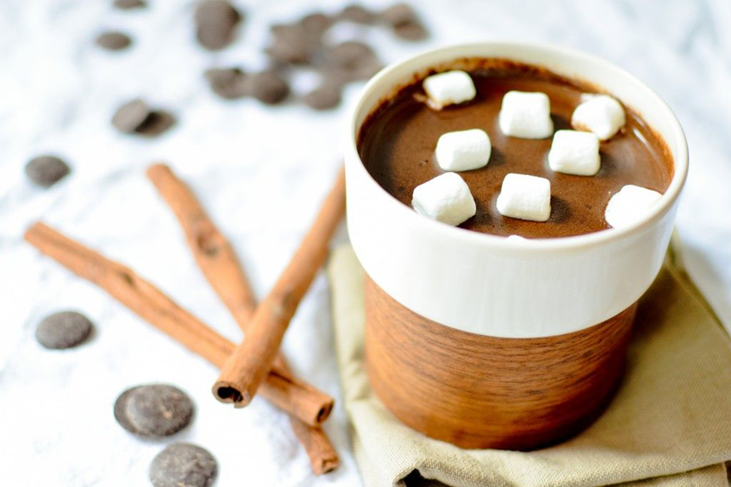 A hot cup of Aztec hot chocolate with marshmallows.