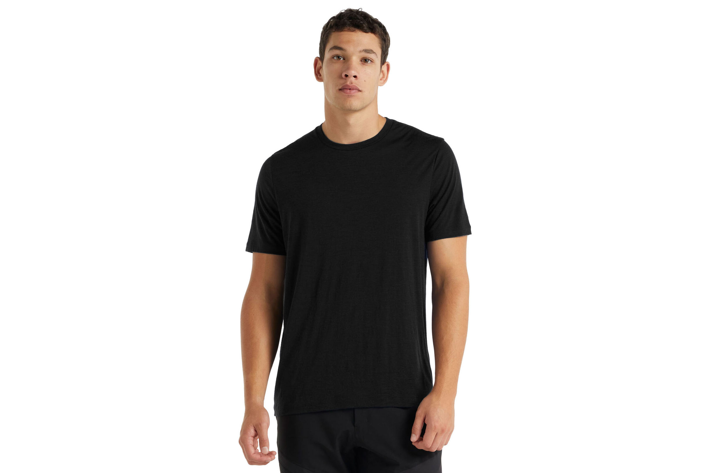 Man wearing a black t-shirt on a white background.