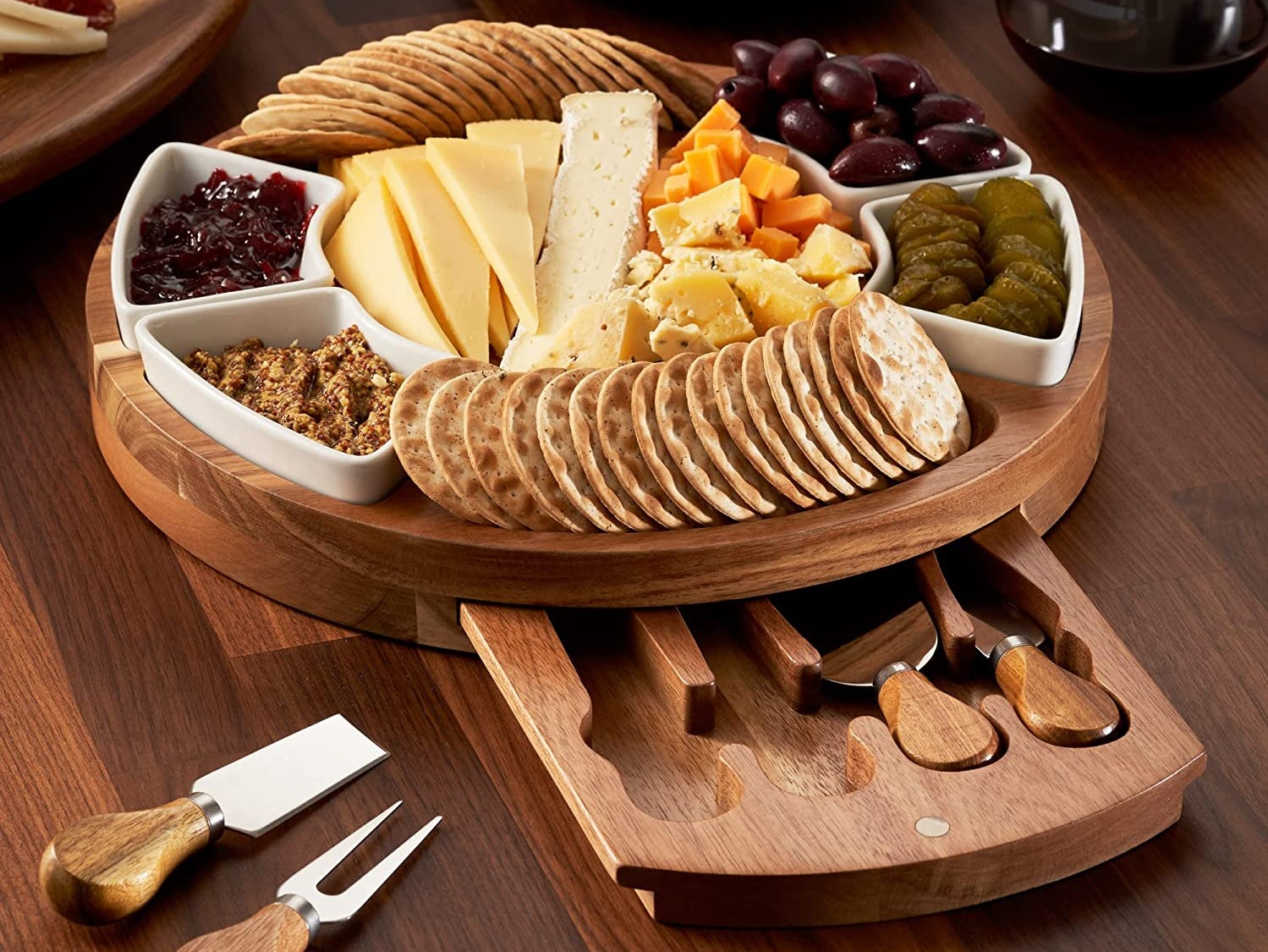 Charcuterie Board Set with food and utensils for parties.