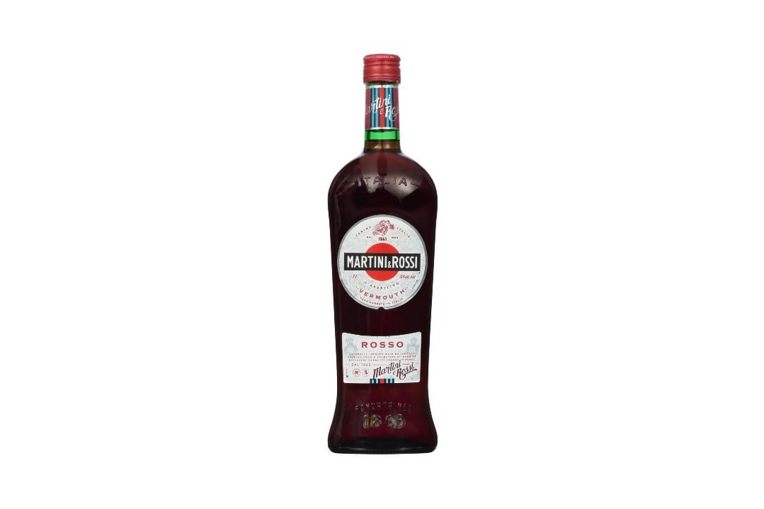 A bottle of Martini 'n Rossi Vermouth on white background.