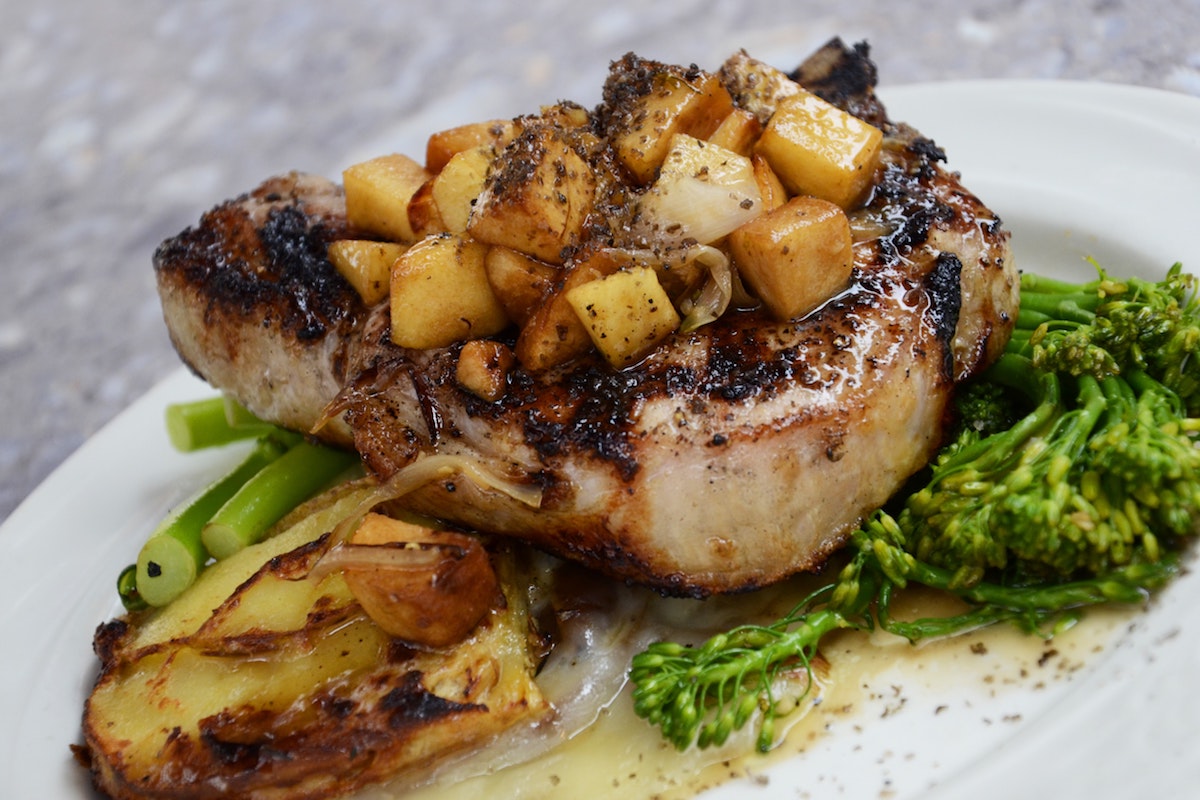 Grilled Pork chops with broccoli rabe.