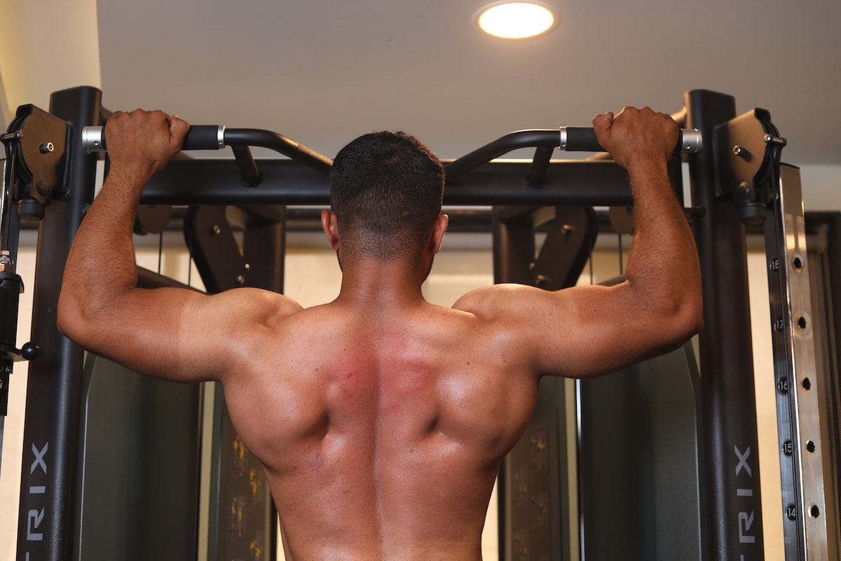 man doing pull-ups.