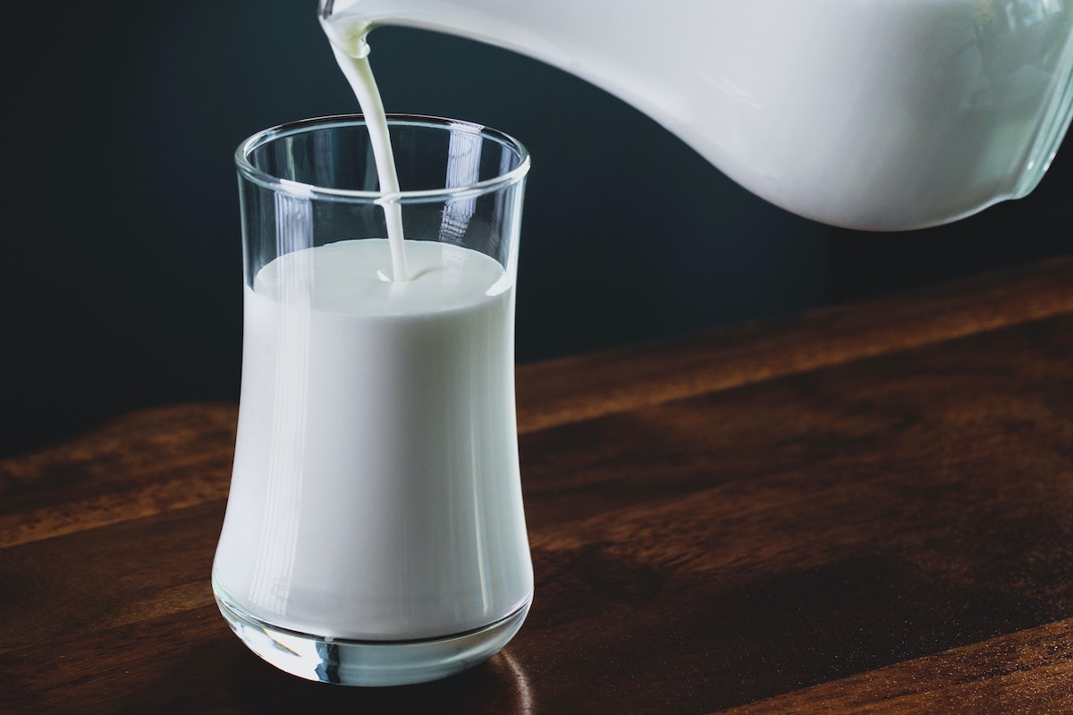 Glass of milk being poured