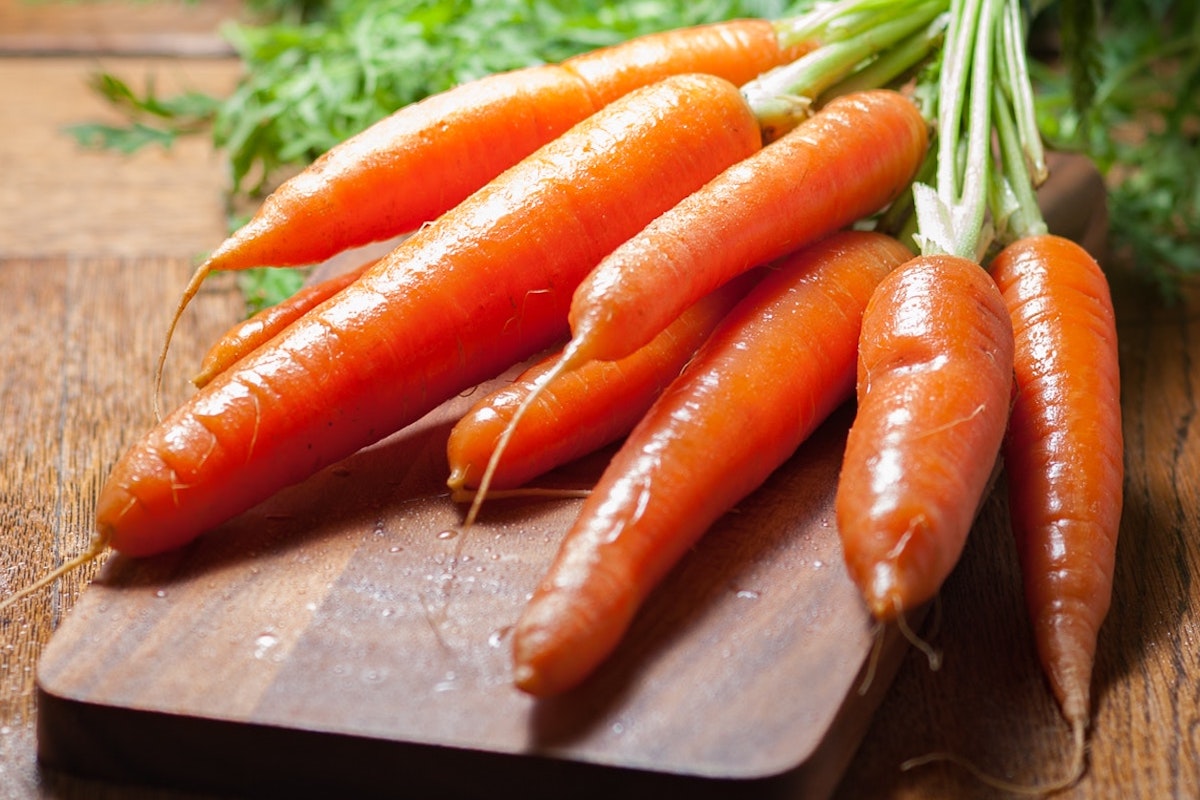 raw carrots with the stems.