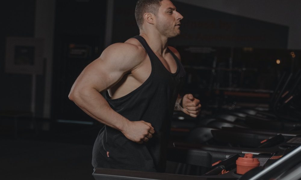 Man doing best HIIT workout on the treadmill