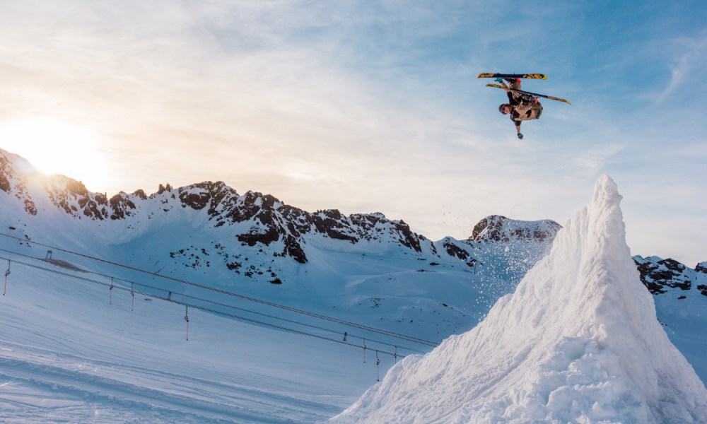 skier doing a flip in the air.