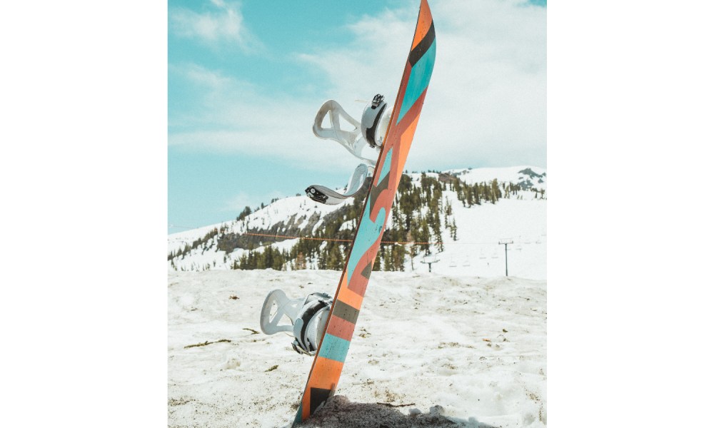 Snowboard in snow