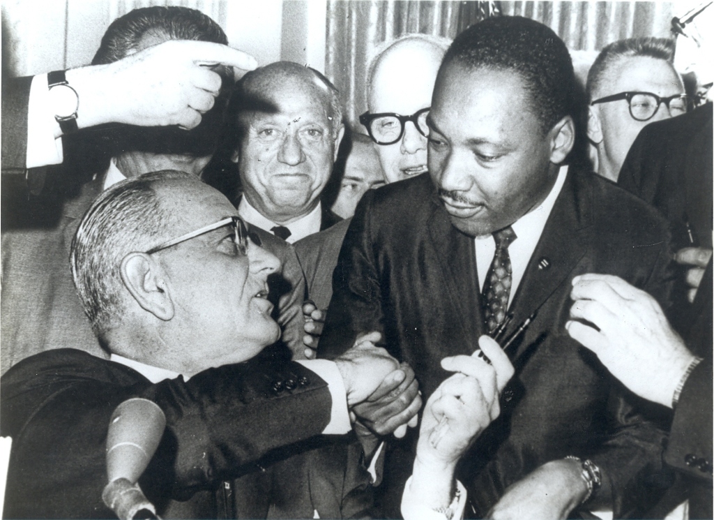 Rev. Dr. Martin Luther King Jr. and President Lyndon B. Johnson.