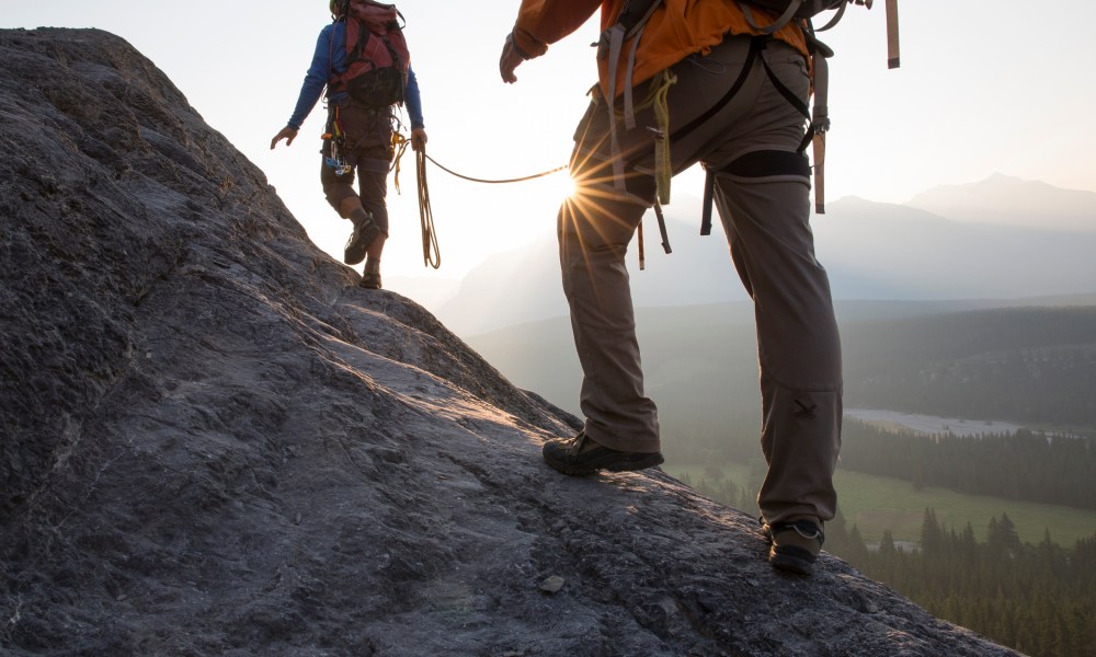 Two people hiking together