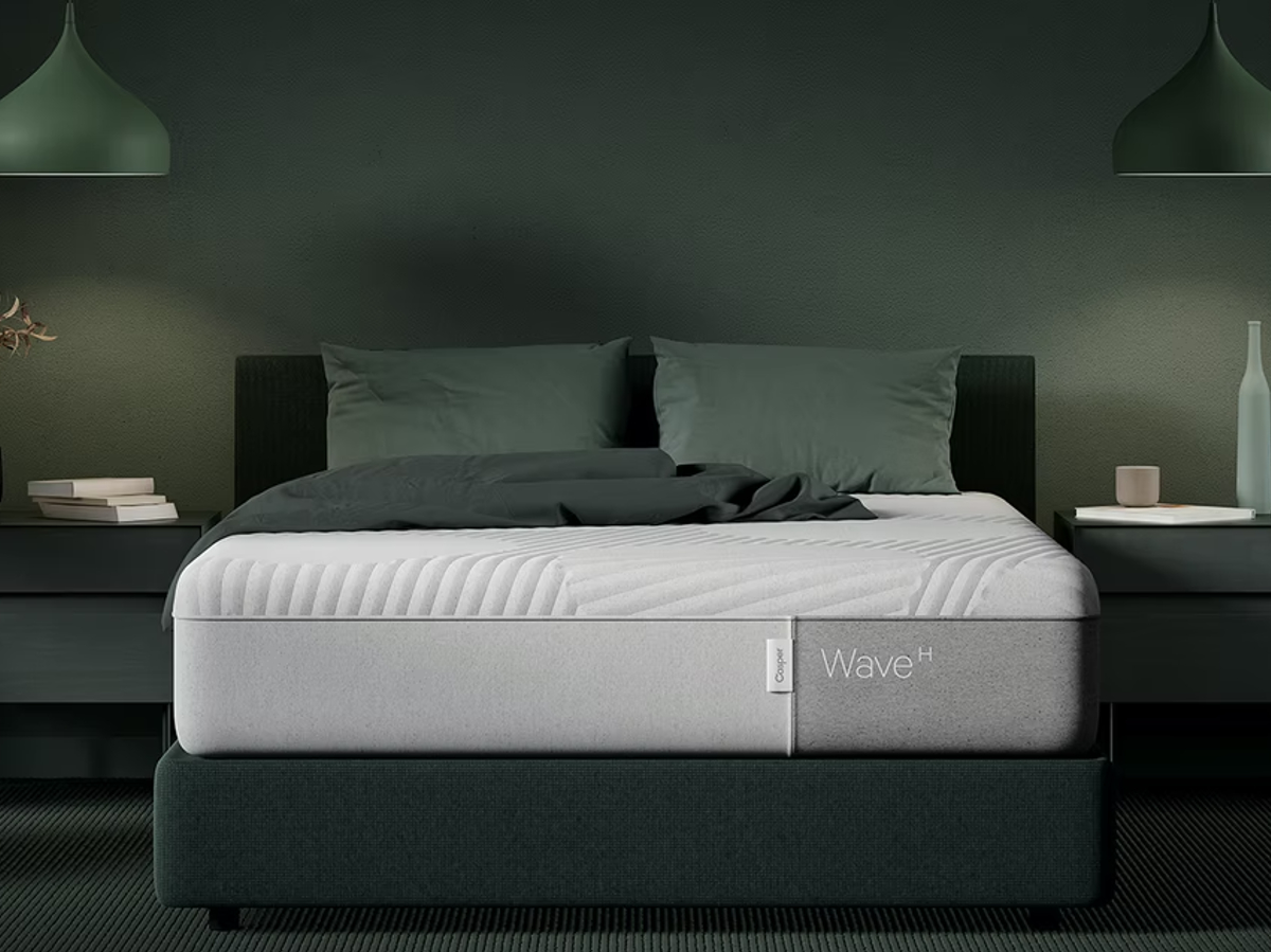 Casper Wave Hybrid mattress queen size on a platform.