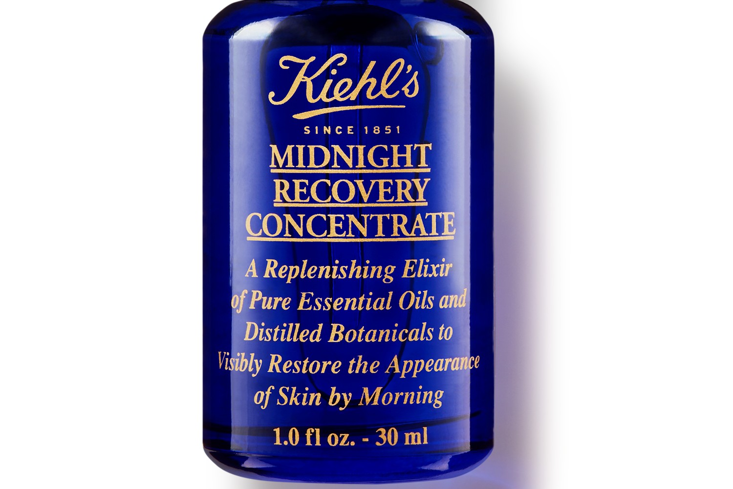 A bottle of Kiehl's Midnight Recovery face serum.