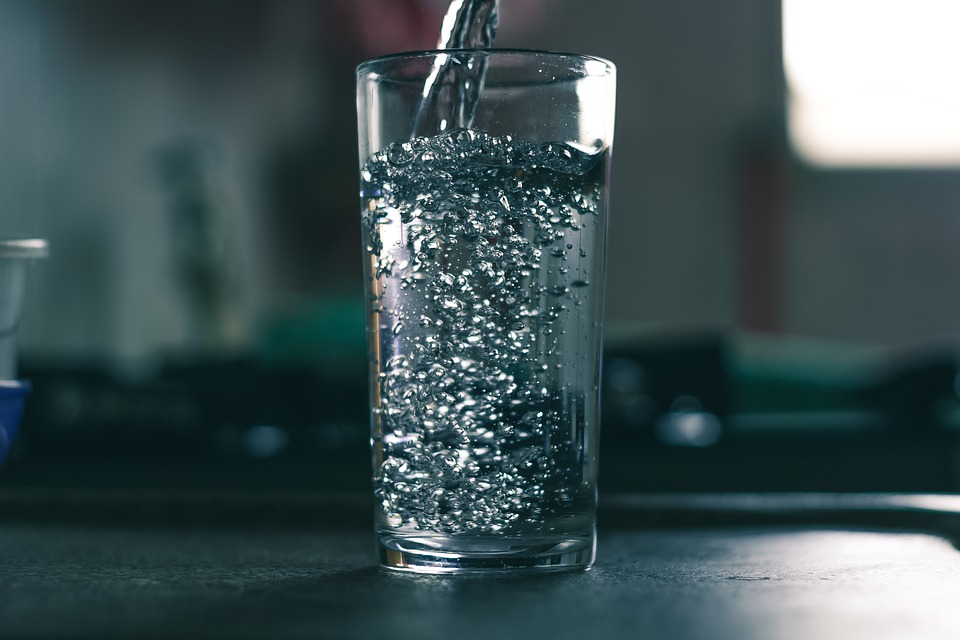 water being poured into a glass