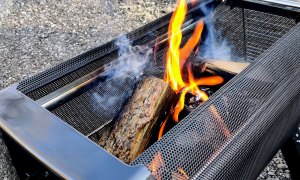 Closeup of campfire inside BioLite FirePit+ fire pit.