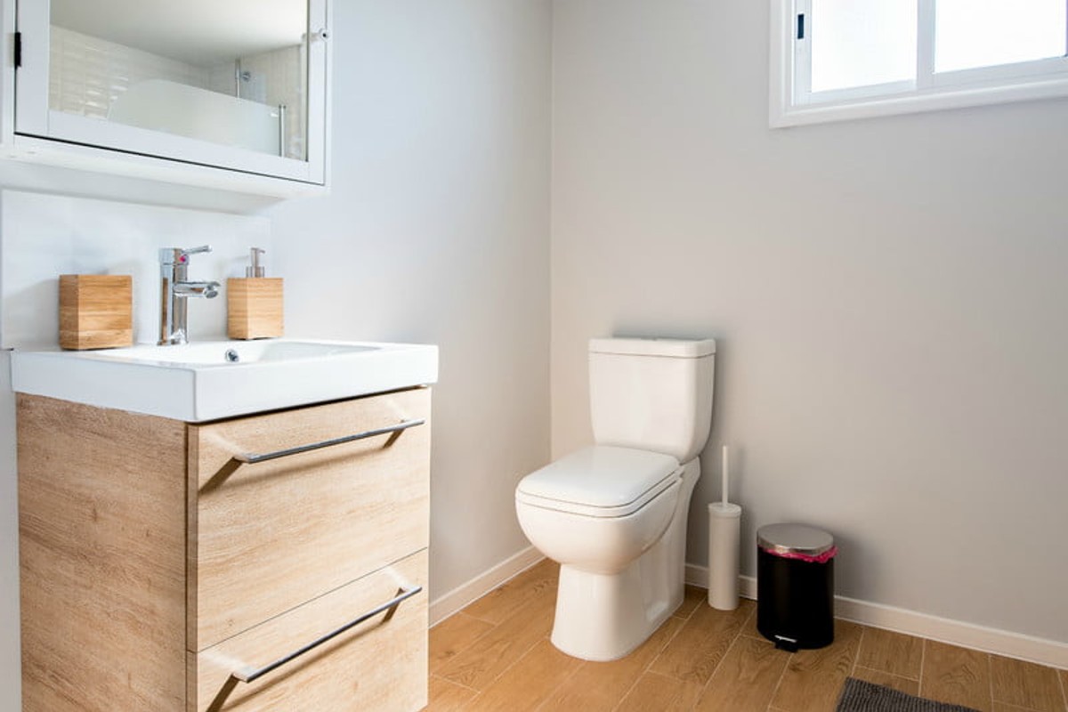 Sparkling clean bathroom sink and toilet