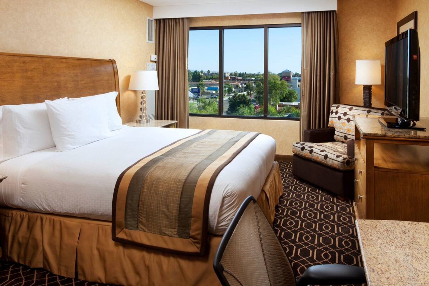 A standard king room at the Doubletree Suites by Hilton Anaheim Convention Center hotel.