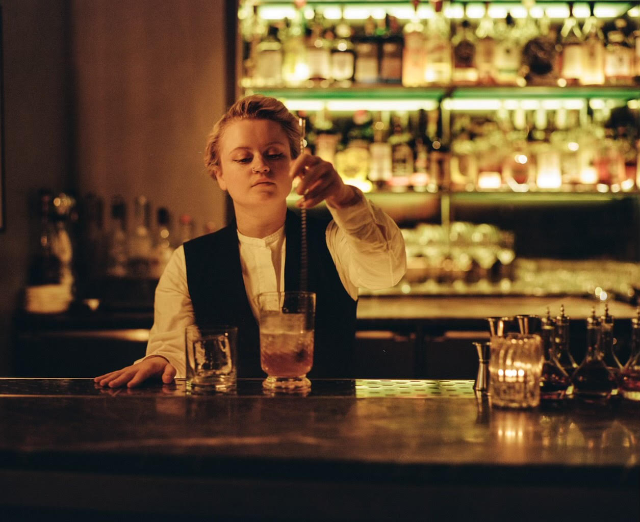 Bartender Kat Foster stirring a cocktail