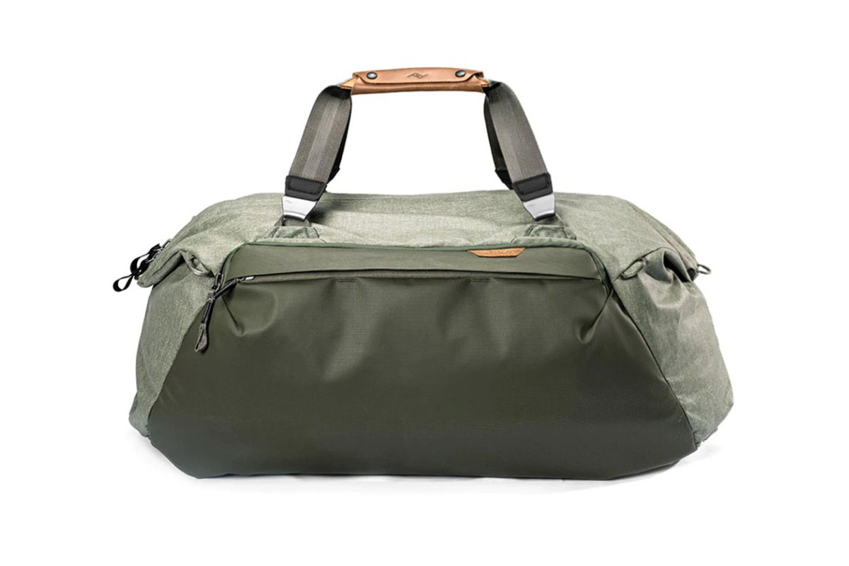 A Peak Design Travel Duffel 65L in sage on a white background.