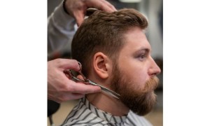 Guy getting his hair cut