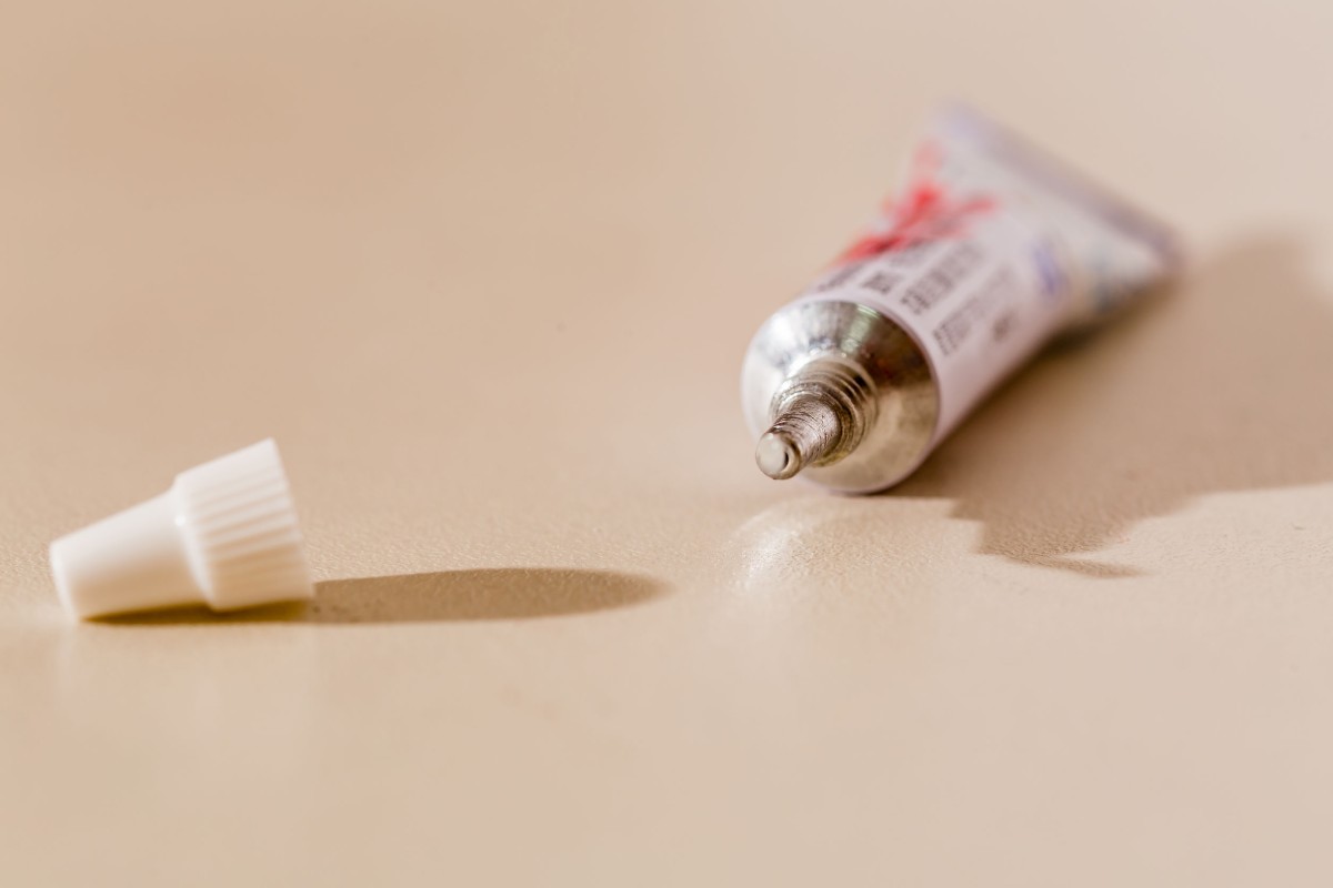 tube of toothpaste with cap removed.