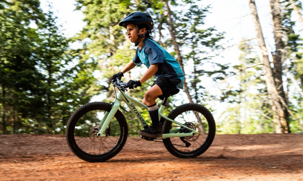 A kid riding a Specialized Riprock bike