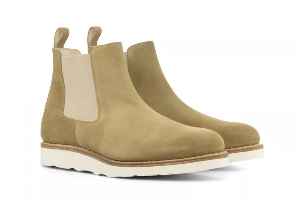 Tan suede Chelsea boots with a white alpine sole.