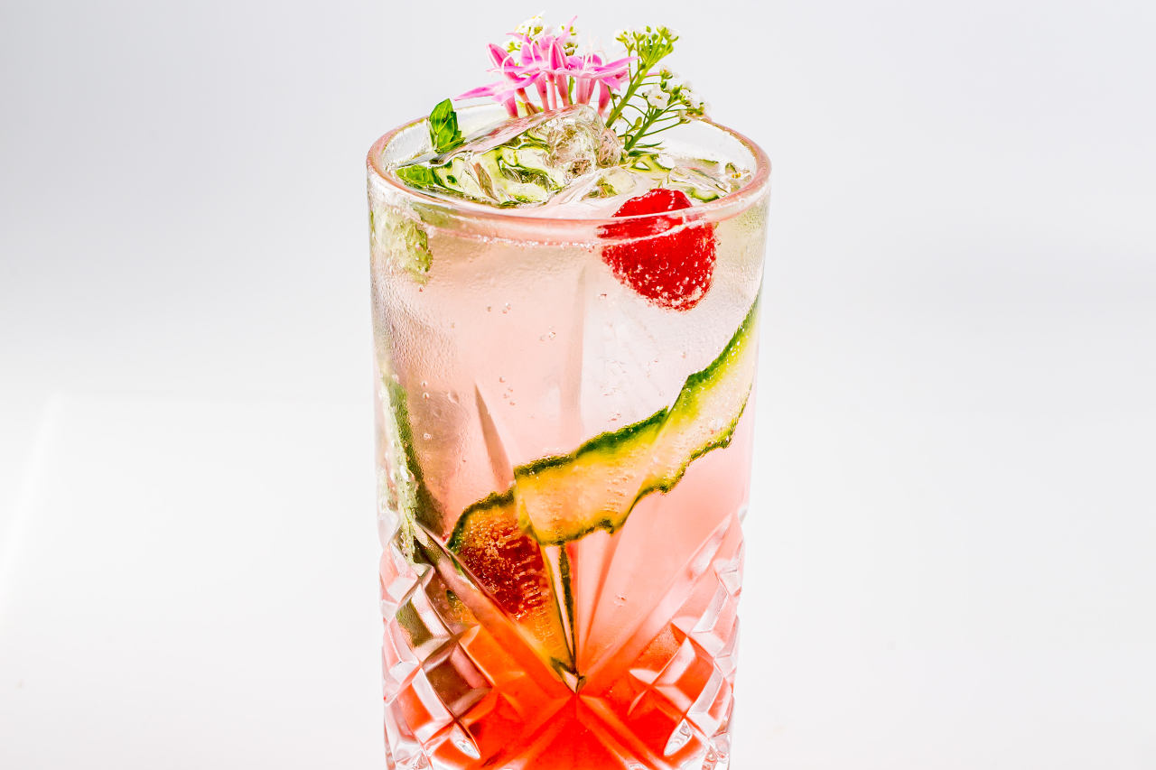 A close up of a Pretty in Pink cocktail.